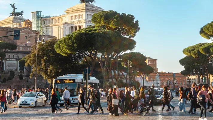 Rome, street with people, bus and taxis, Via dei Fori Imperiali with tourists (Imperial Forums street). Rome, Italy - 8th January 2024, License Type: media, Download Time: 2025-02-18T21:18:57.000Z, User: katelyn.perry_lonelyplanet, Editorial: true, purchase_order: 65050 - Digital Destinations and Articles, job: WiP, client: WiP, other: Katelyn Perry