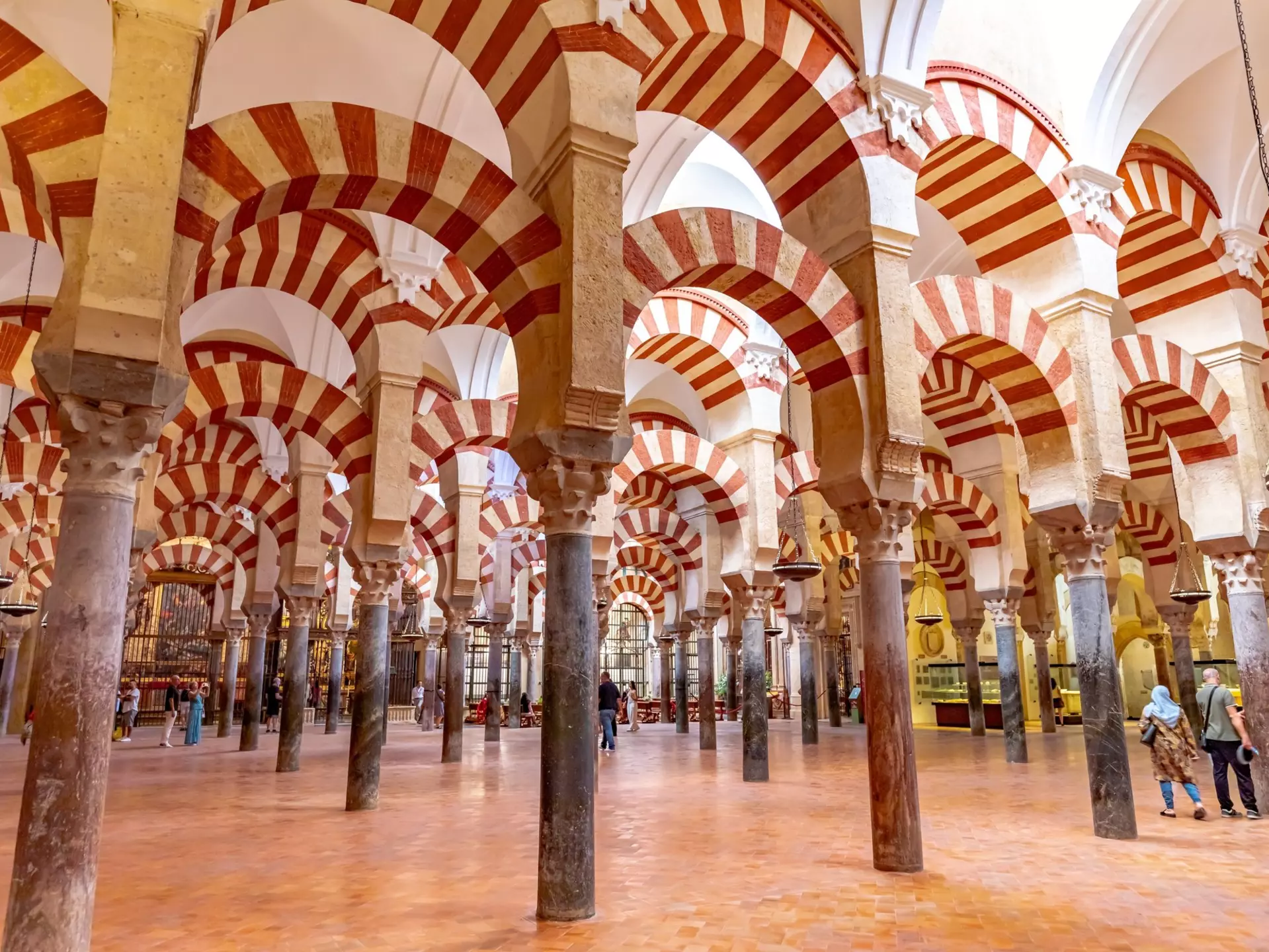 Red-and-white striped arches and columns.
