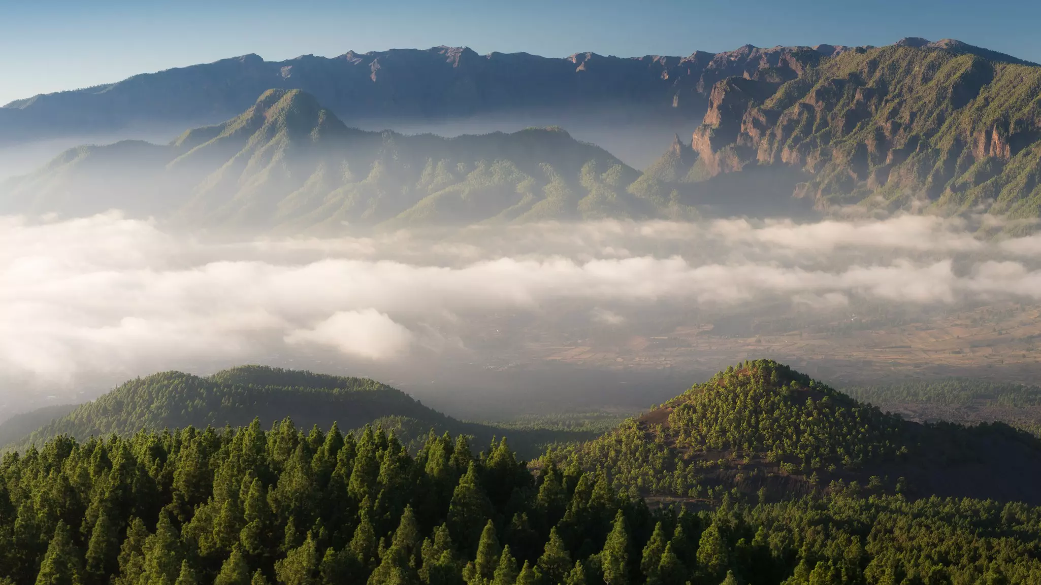 Clouds in a valley in Spain's Canary Islands.