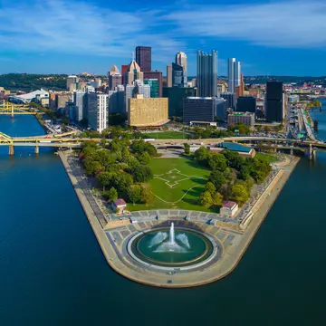 Downtown Pittsburgh skyline aerial view with Fort Duquesne (including a fountain), Point State Park, I-279, Allegheny River (left), Fort Duquesne Bridge (left), Monongahela River (right) and Fort Pitt Bridge (right) in the foreground.
1027467444
