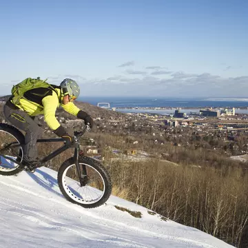 Man fatbiking on a trail in winter in Duluth, Minnesota
567085477
30-34 Years, Adult, adults only, adventure, Backpack, Bicycle, Caucasian Ethnicity, Cold Temperature, color image, cycling, day, Duluth, Full Length, Helmet, Horizontal, men, Minnesota, Mode Of Transport, One Man Only, One Mid Adult Man Only, One Person, On The Move, outdoors, People, Riding, Side View, snow, Sport, Transportation, travel, Weather, winter