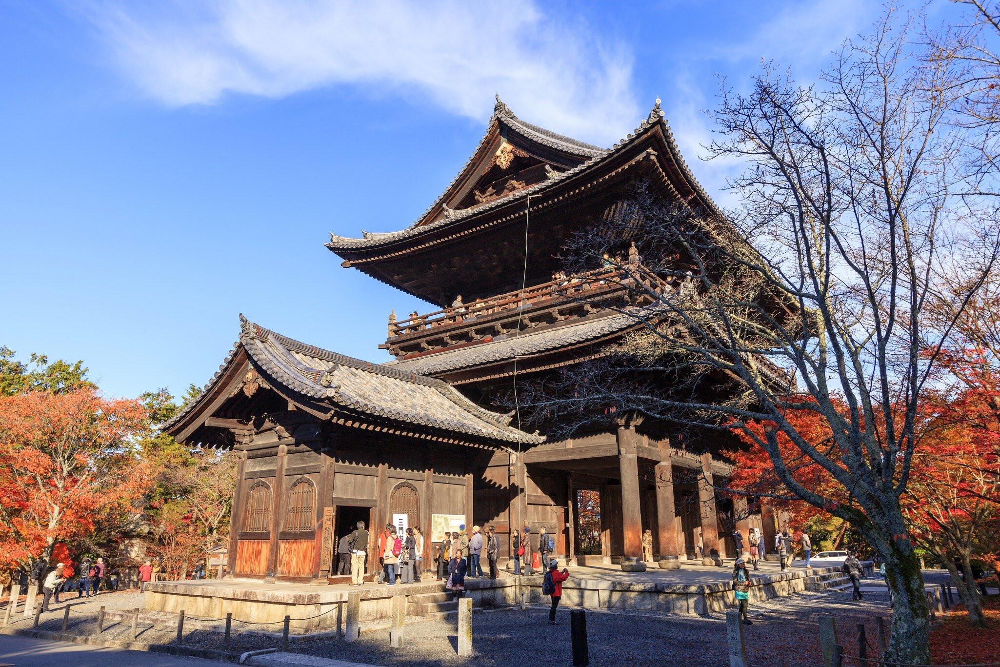 KYOTO, JAPAN -NOV 25, 2012: Tourists around the Sanmon gate at Nanzenji Temple in autumn. This Sanmon gate was constructed in 1628 for soldiers who died in the siege of Osaka Castle in 1615.
397732636
architecture, asia, asian, attraction, autumn, balcony, beautiful, buddhism, building, calm, colorful, contemplate, contemplation, cultural, culture, entrance, fall, garden, gate, japan, japanese, ji, kansai, kyoto, maple, momiji, nanzen, nanzen-ji, nanzenji, old, outdoor, peaceful, people, religion, sanmon, serene, serenity, sightseeing, spiritual, stone, temple, tourism, tourists, tradition, traditional, travel, tree, wood, wooden, zen