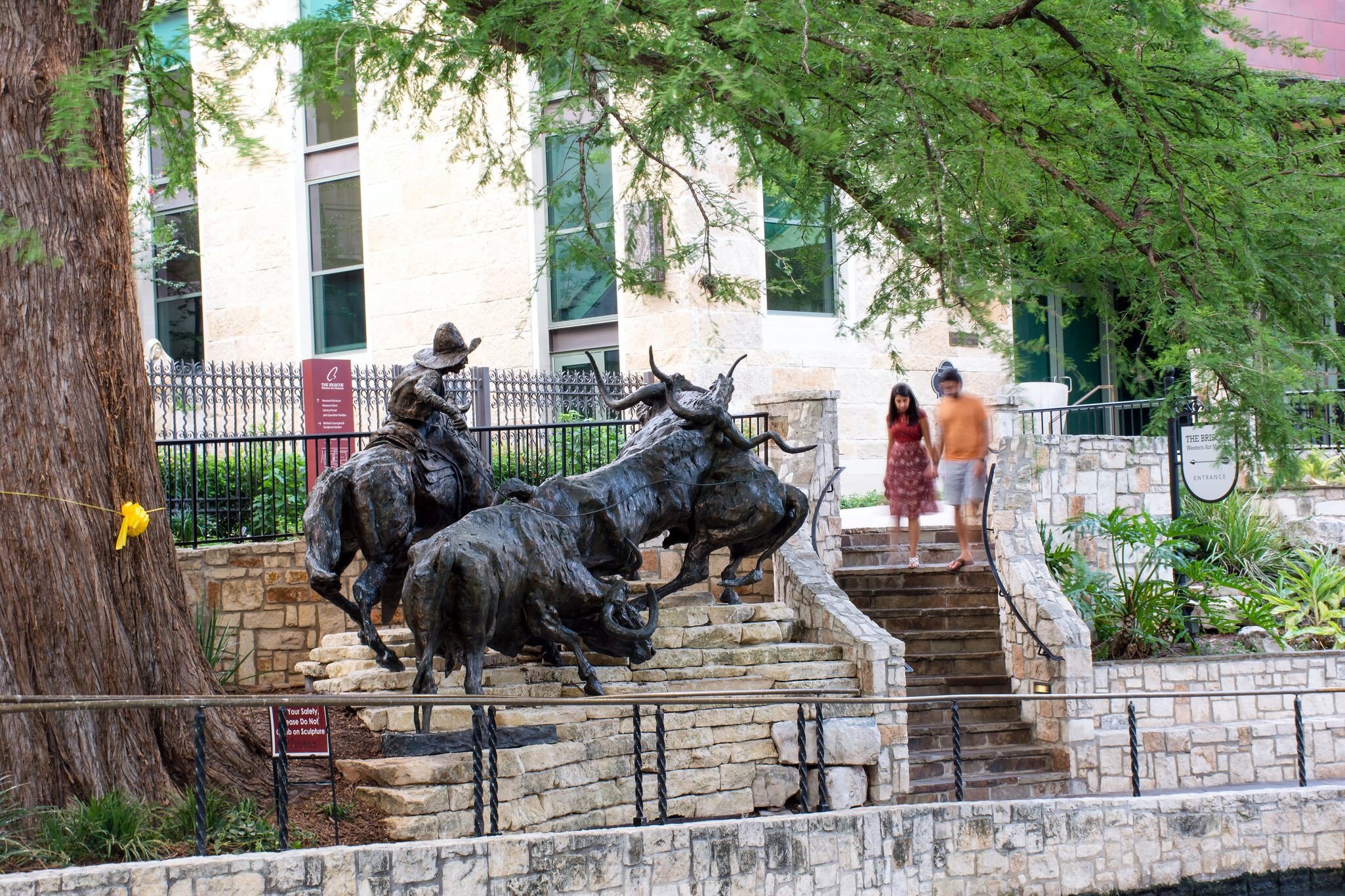 San Antonio, TX/USA- May 18 2019: "Coming Home to the Briscoe" is a statue by artist T.J.Kelsey outside the Briscoe Western Art Museum along the San Antonio River Walk, San Antonio, Texas.; Shutterstock ID 1444943180; your: Bridget Brown; gl: 6505...