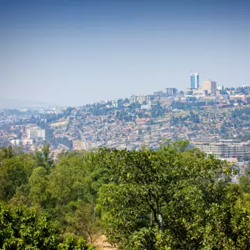 The rolling landscape of Kigali, Rwanda is an unmissable characteristic of the city, responsible for the incredible views you can find almost anywhere © Image via Getty Images; Illustration by Dustin Johnson / Lonely Planet