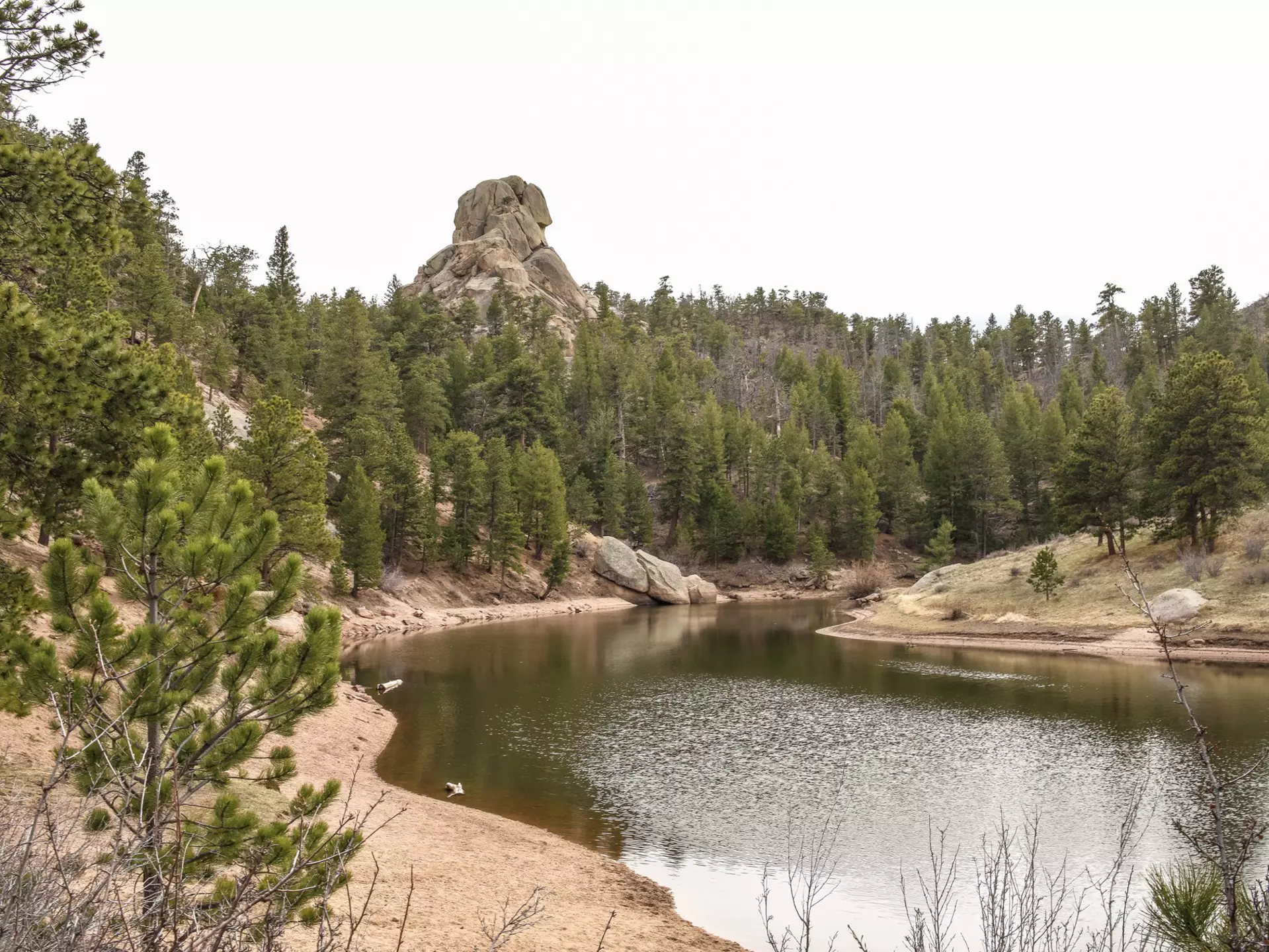 One of the reservoirs in Curt Gowdy State Park with mountains in the background