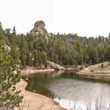 One of the reservoirs in Curt Gowdy State Park with mountains in the background