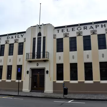 Napier, New Zealand, December 24, 2018: Daily Telegraph building, one of Napier's most famous art deco buildings. After an earthquake in 1931 Napier was rebuilt in art deco style.; Shutterstock ID 1308112384;