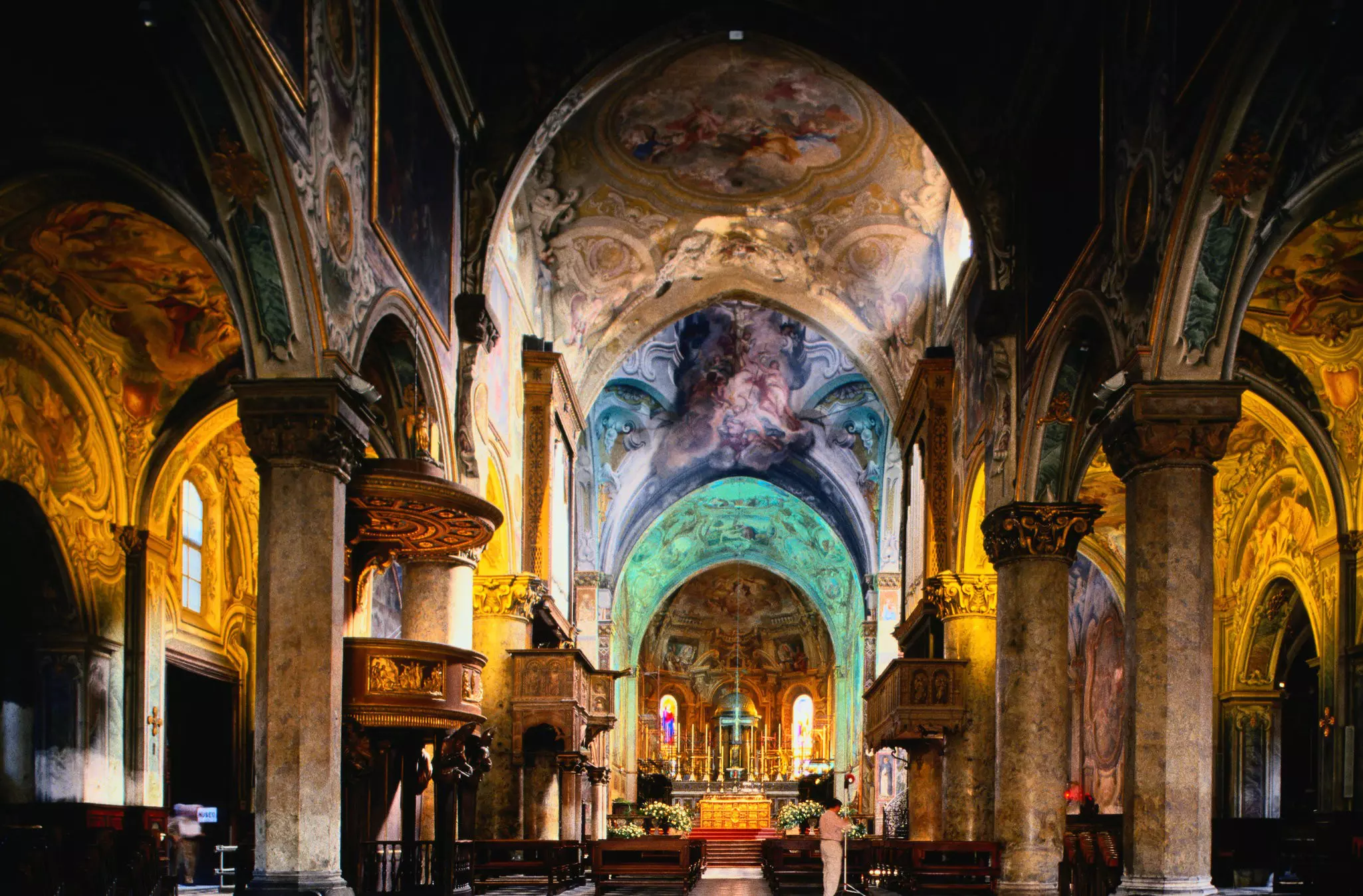 Ornately painted domed ceilings in a cathedral